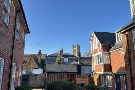 Bright modern courtyard with charming town view...