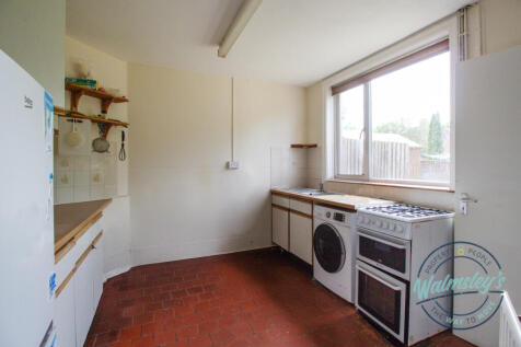 Kitchen overlooking gardens to rear