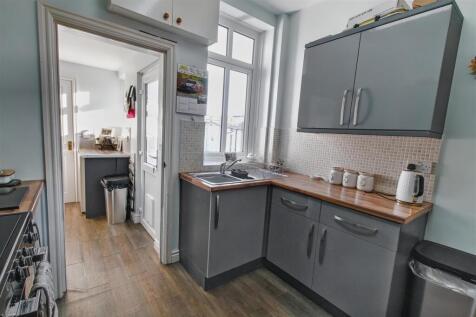 Kitchen through to Utility