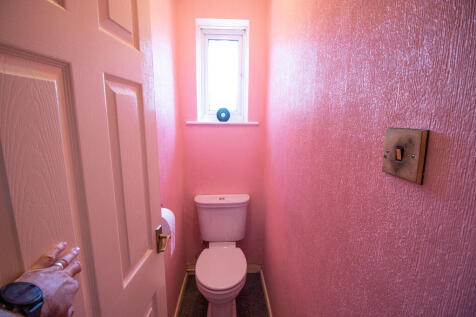 Toilet (standalone, adjacent to the F...