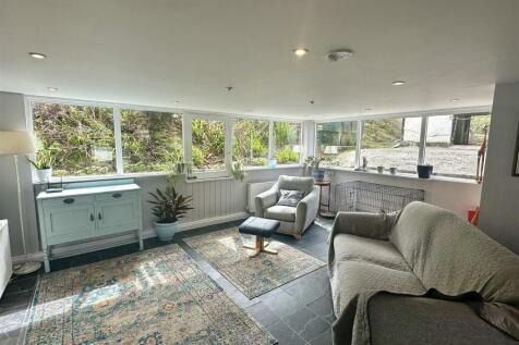 SUN LOUNGE/RECEPTION ROOM