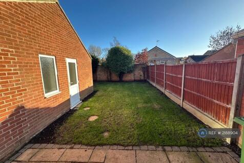 Garden And Side Door To Converted Garage