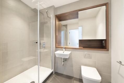 Experience luxury in everyday living with this sleek modern bathroom design.