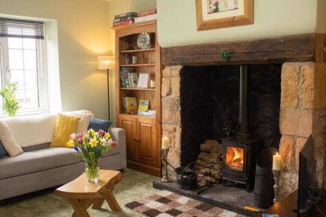 Lounge with inglenook fireplace - front aspect
