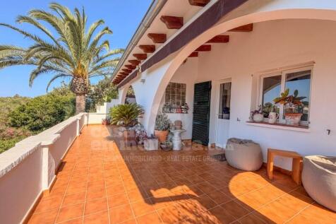 House surrounded by countryside in Cala Santandria