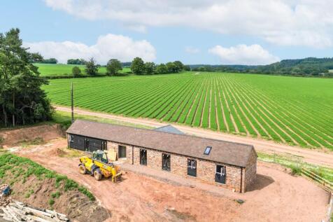 A completed version of one of the barns