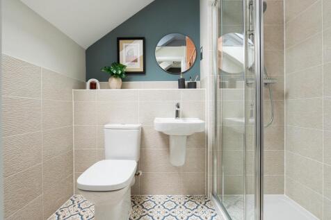 Bedroom 1 also hosts a private en-suite shower room