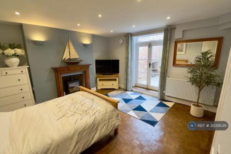 Bright Main Living Area With French Doors