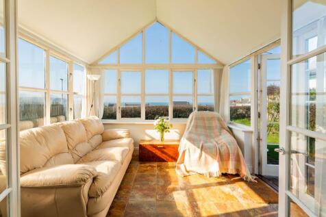 Conservatory to rear with sea views