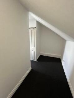 A clean and well-maintained small storage area ...