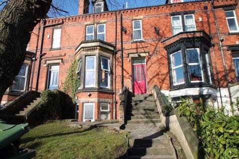 Attractive red-brick terraced house with bay wi...