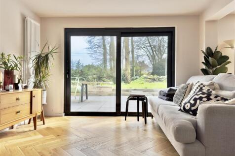 LIVING ROOM DOORS TO REAR PATIO.jpeg