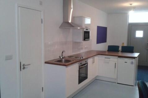 Modern kitchenette with breakfast bar seating...