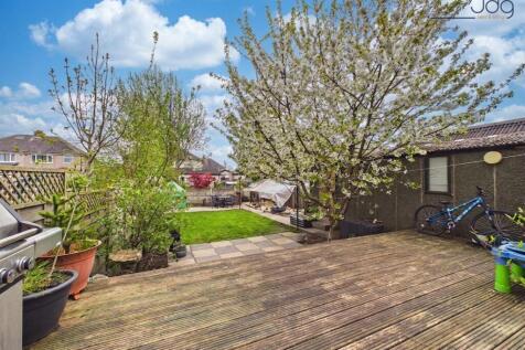 Spacious Garden with mixture of lawn, flags and decking
