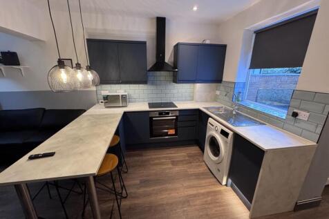 Modern kitchen with stylish breakfast bar...