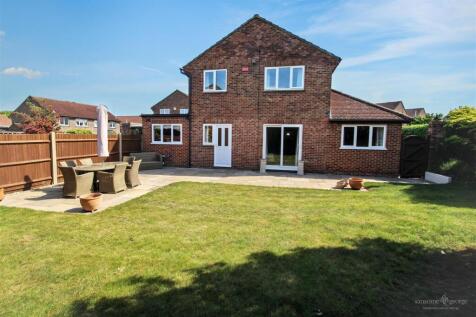 Rear Of Home