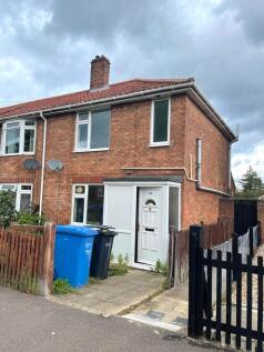 Brick-built semi-detached house with a tiled ro...