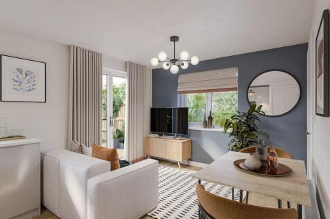 An open-plan lounge/dining space includes double doors that to the garden
