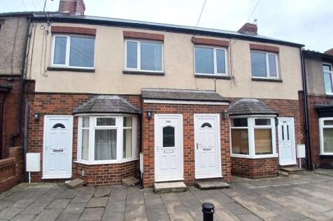 FRONT ELEVATION OF ALL FOUR APARTMENTS