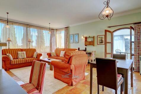 wall of windows &amp; door to sun room