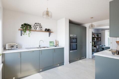 The modern kitchen leads through toe the dining area, perfect for you to entertain friends and fami