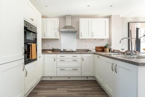 Good sized kitchen area with breakfast bar
