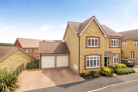 Front Elevation  with double garages and driveway
