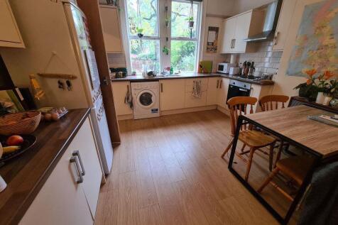 Bright, modern kitchen with plenty of worktops,...