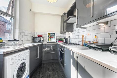 Modern gloss kitchen with ample workspace...