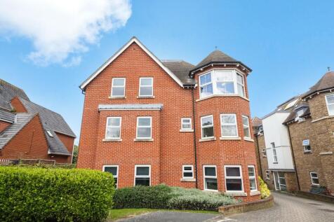 Stunning brick house with bright bay windows...