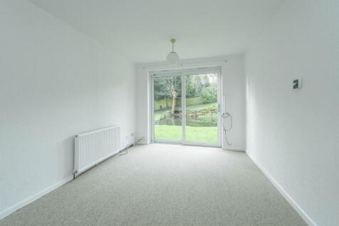 SITTING ROOM DINING AREA HALLWAY AND KITCHEN