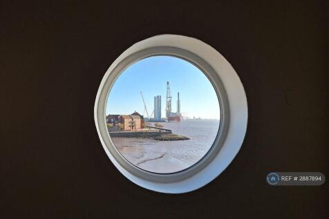 Port Hole Window In Stairwell