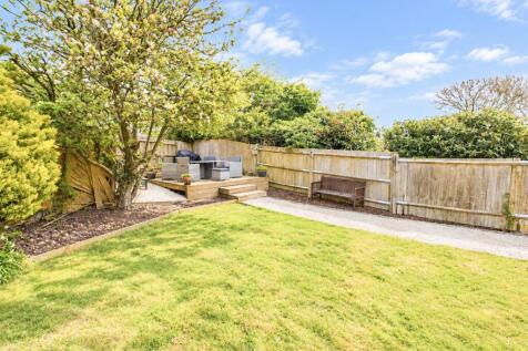 10-Sunlit Spring Garden Deck and Lawn.jpg