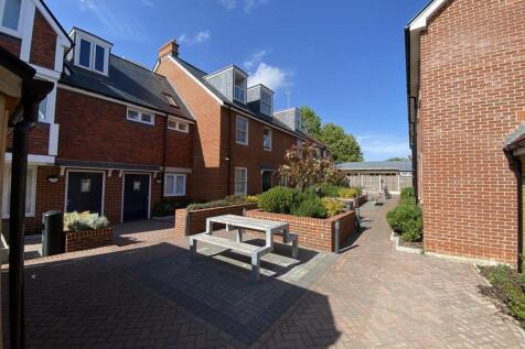 Beautiful sunny courtyard with seating area...