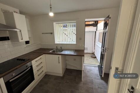 Kitchen And Entrance To Flat