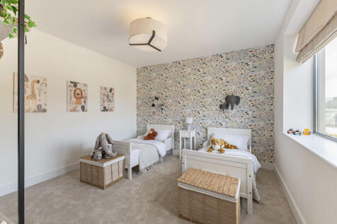 Internal photos are of the show home
