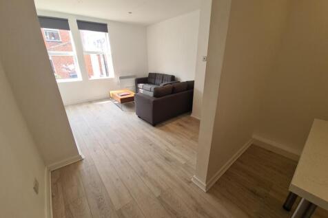 Bright and welcoming living room with a comfort...