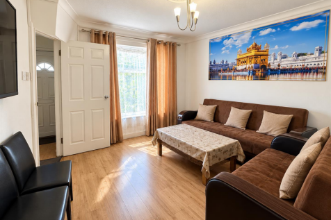 Bright Modern Living Room with Golden Temple Artwo