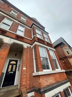 Attractive red-brick period building with bay w...