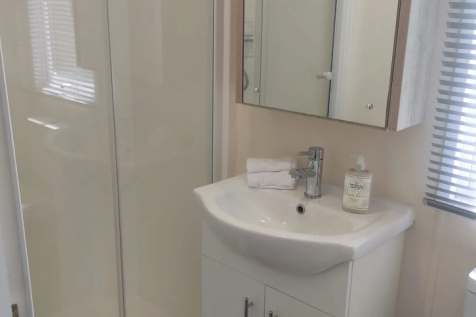 En Suite Shower Room With Vanity Unit, Toilet And 