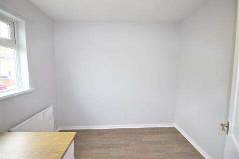 Freshly decorated room with bright natural ligh...