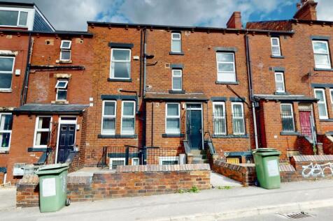 Exterior view of a traditional brick residentia...