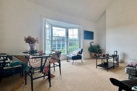 Sitting room with bay window and views