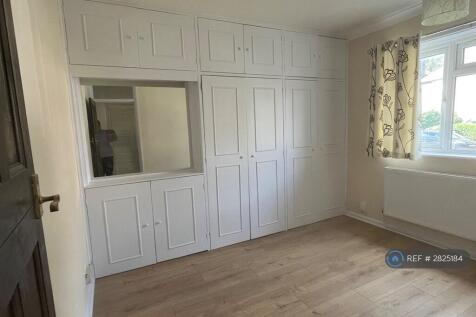 Bedroom With Built In Cupboards