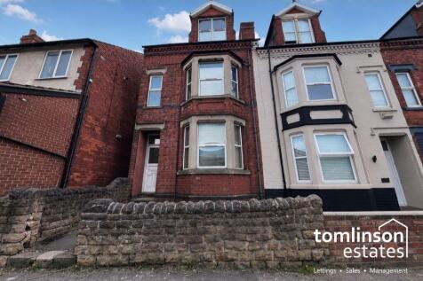 Terraced house with two flats
