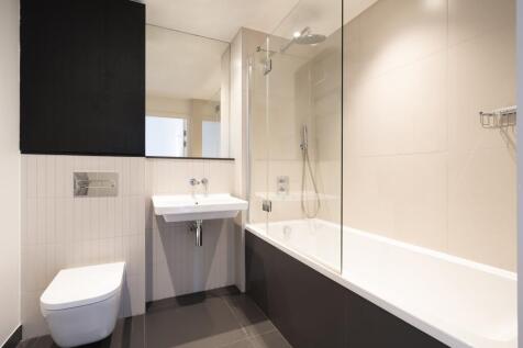 Experience sophistication in this modern bathroom, designed for ultimate relaxation and style.