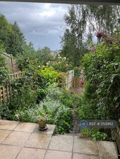 View From Garden Room And Patio