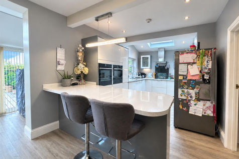 Bright Modern Kitchen With Breakfast Bar (1).png