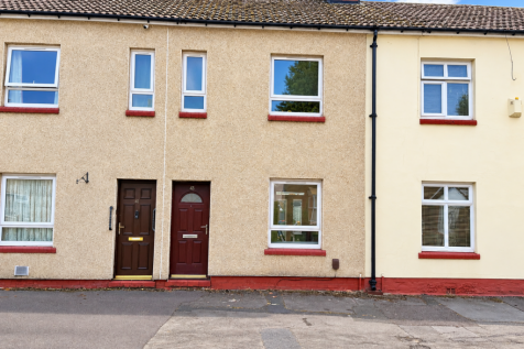 Terraced Houses Under a Blue Sky.png