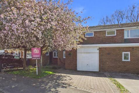 House for sale with pink blossom
